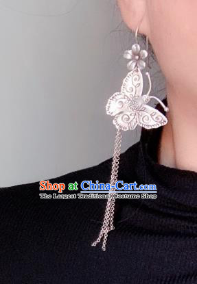 China Traditional Cheongsam Long Tassel Ear Accessories National Silver Carving Butterfly Earrings