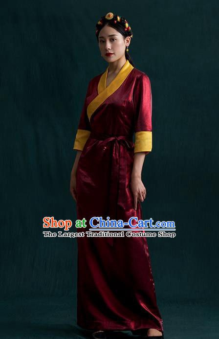 China Traditional Tibetan Ethnic Woman Clothing Zang Nationality Kangba Wine Red Bola Dress