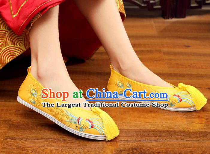 China Embroidered Phoenix Shoes Handmade Bride Shoes XiuHe Yellow Satin Shoes Classical Wedding Tassel Shoes